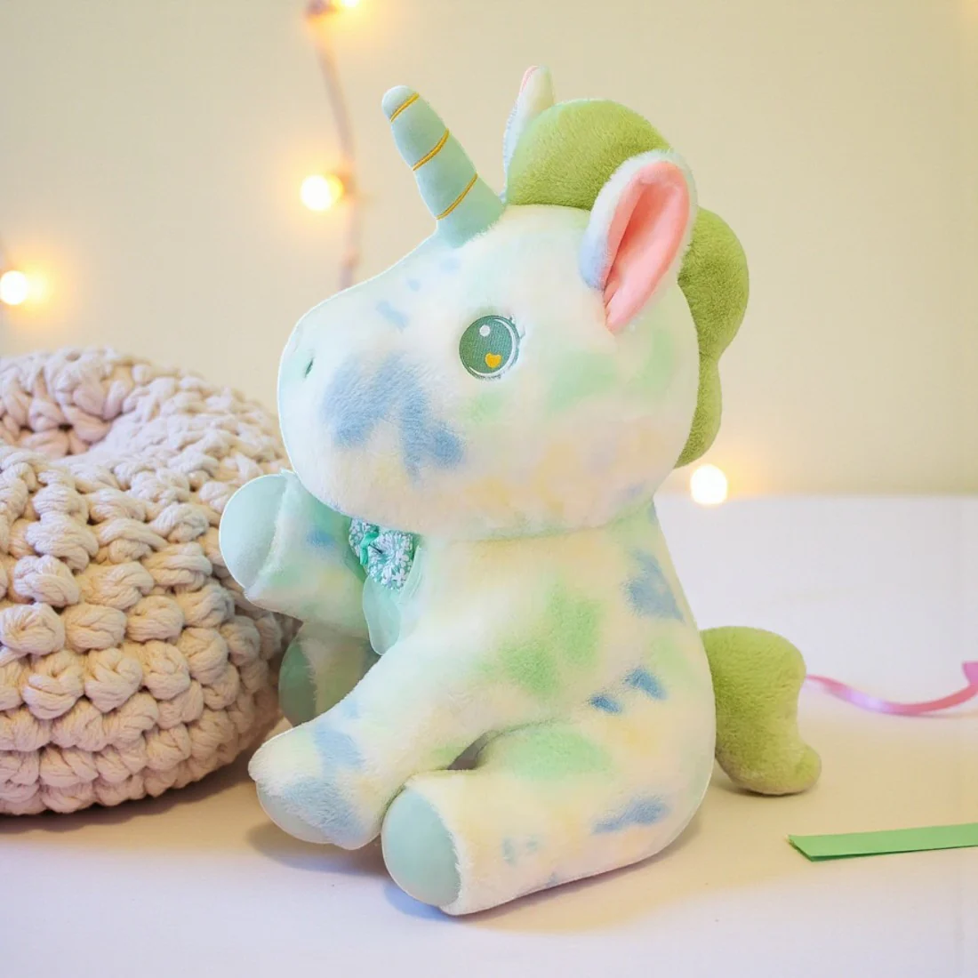 Peluche licorne pastel pour enfant avec nœud fleuri – Image 3